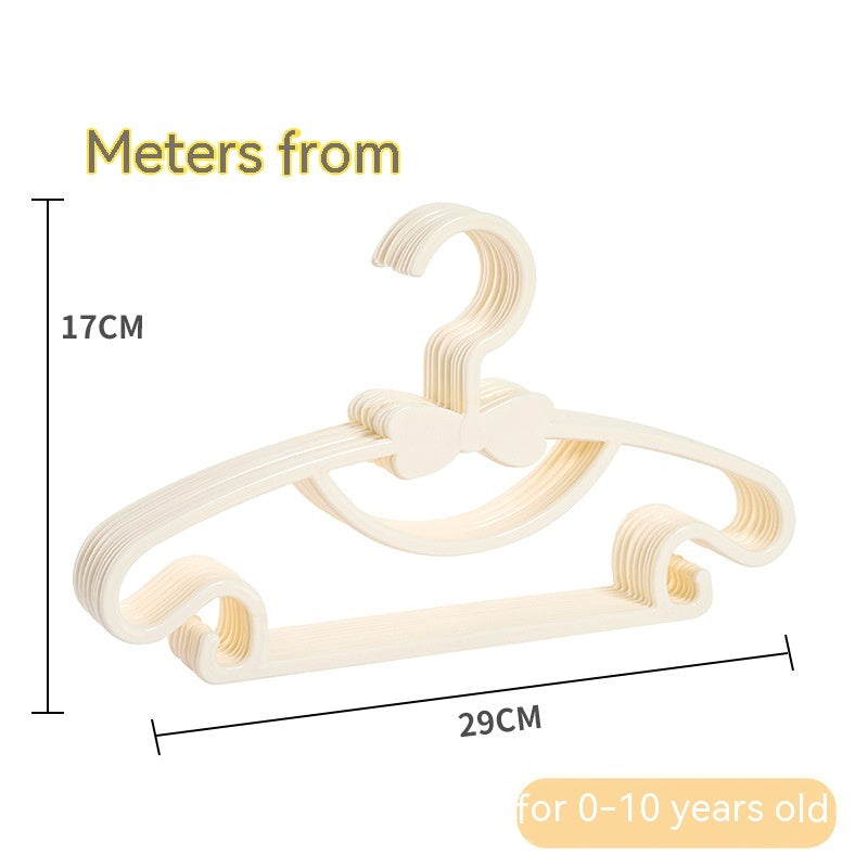 Beige children's clothes hangers with bow details, showing 29 cm width and 17 cm height
