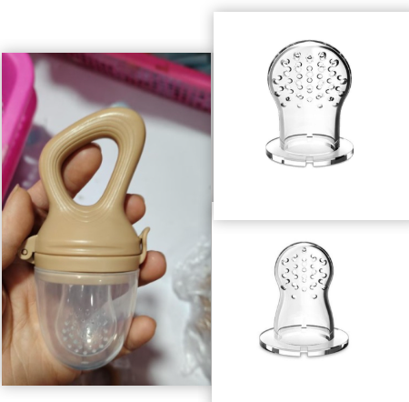 Hand holding a beige baby food feeder, shown beside two clear silicone nipples