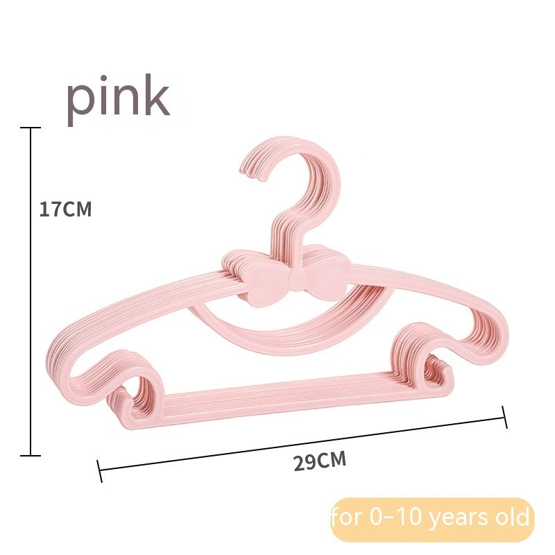 Pink children's clothes hangers with bow details, showing 29 cm width and 17 cm height