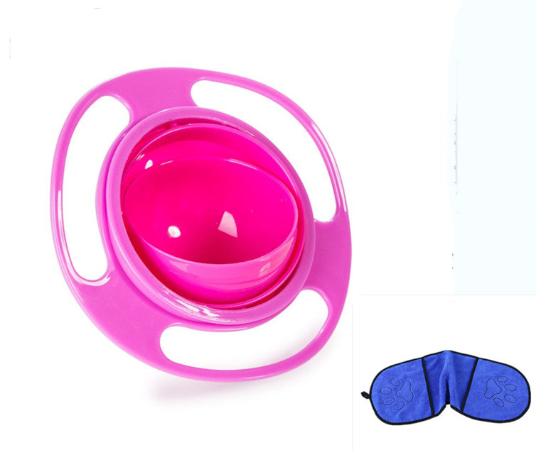 Pink rotating snack bowl beside a blue Towel