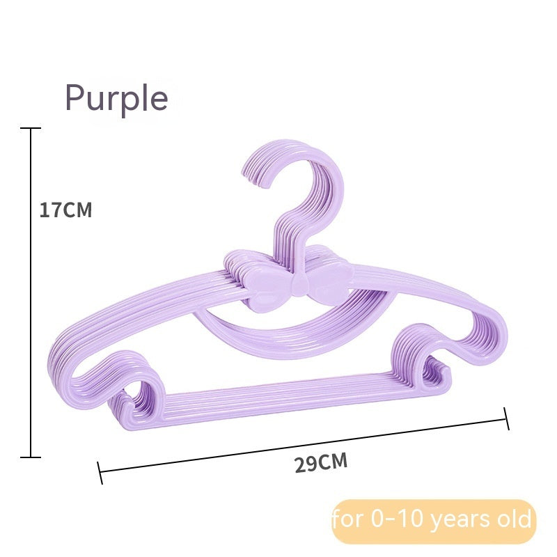 Purple children's clothes hangers with bow details, showing 29 cm width and 17 cm height