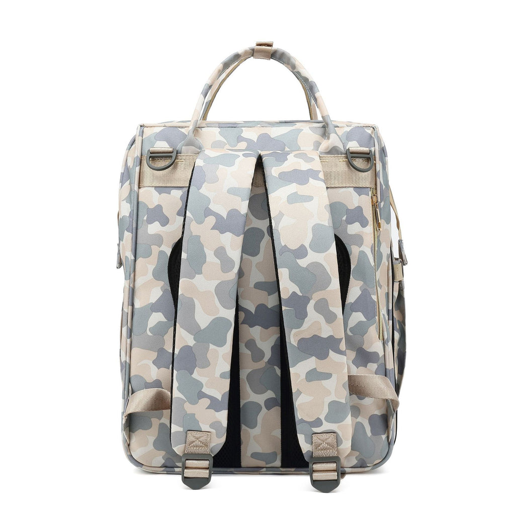 Rear view of a camouflage diaper backpack with padded adjustable shoulder straps